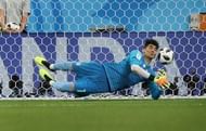 Iran's goalkeeper Alireza Beiranvand saves Cristiano Ronaldo's penalty in the FIFA World Cup